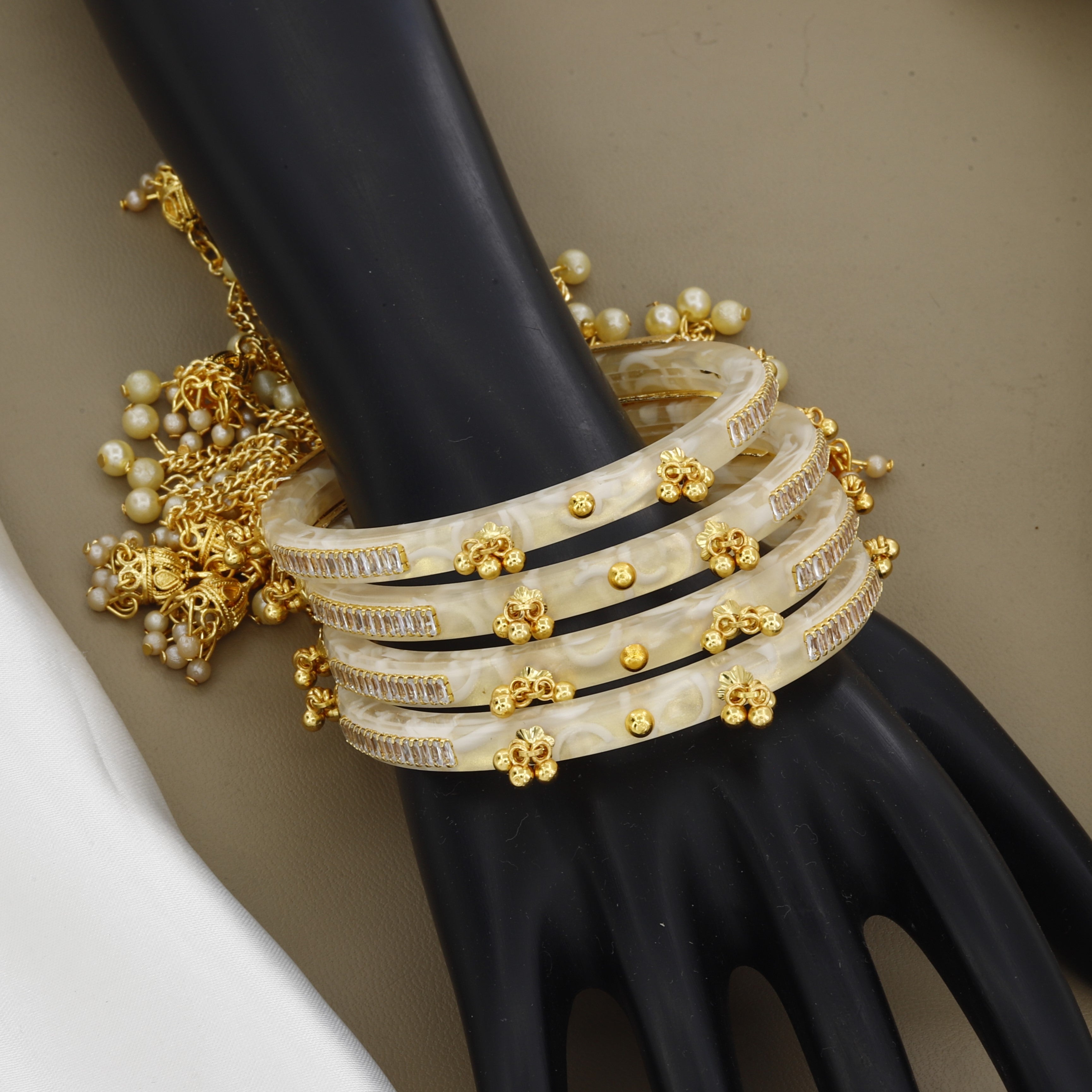 Set of 4 White Pearl-Finish Bangles with Crystal and Gold Accents