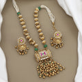 Traditional Gold & Pearl Kundan Necklace and Jhumka Set with Ruby Accents