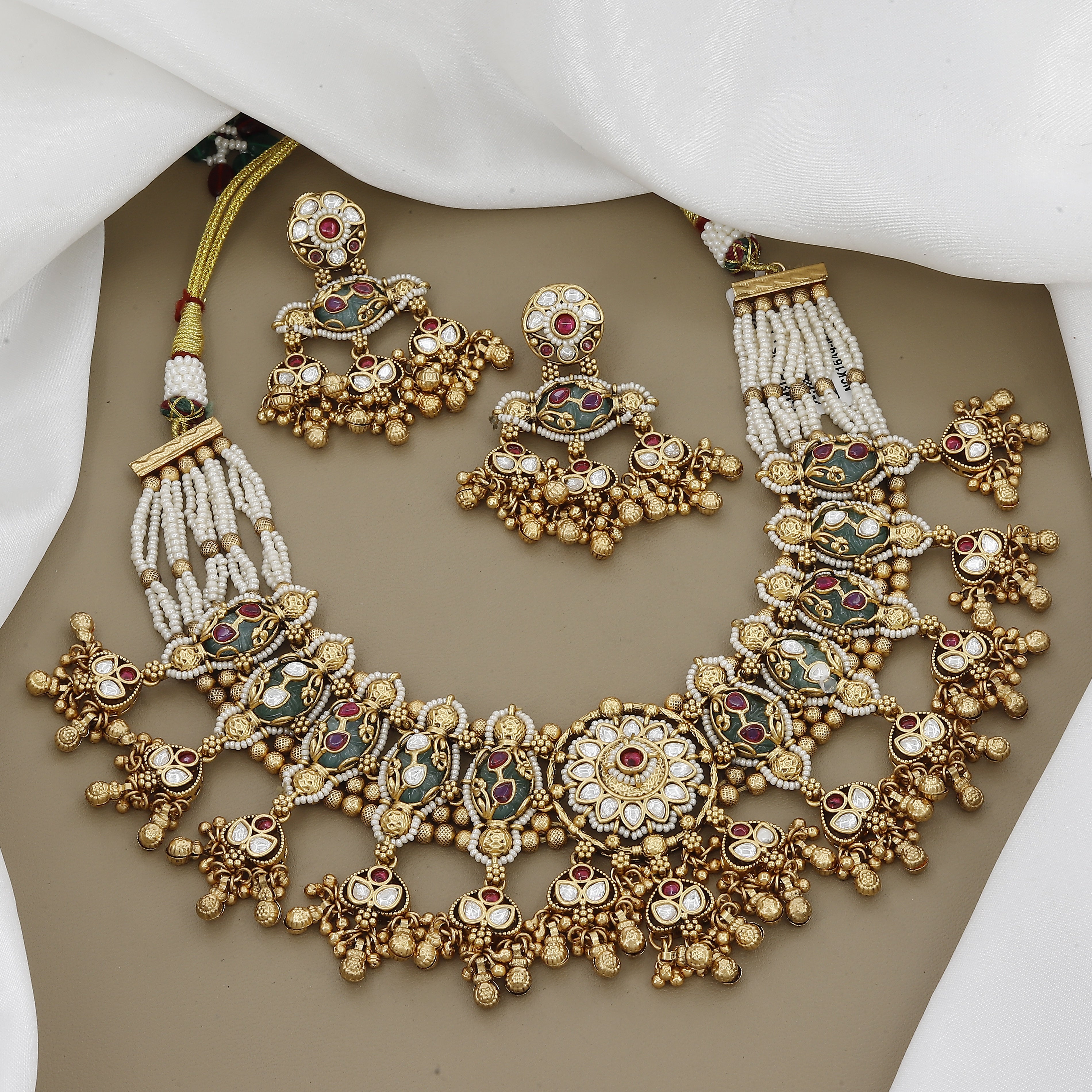 Gold Toned Collar Necklace Set with Linked Ruby & Kundan Medallions