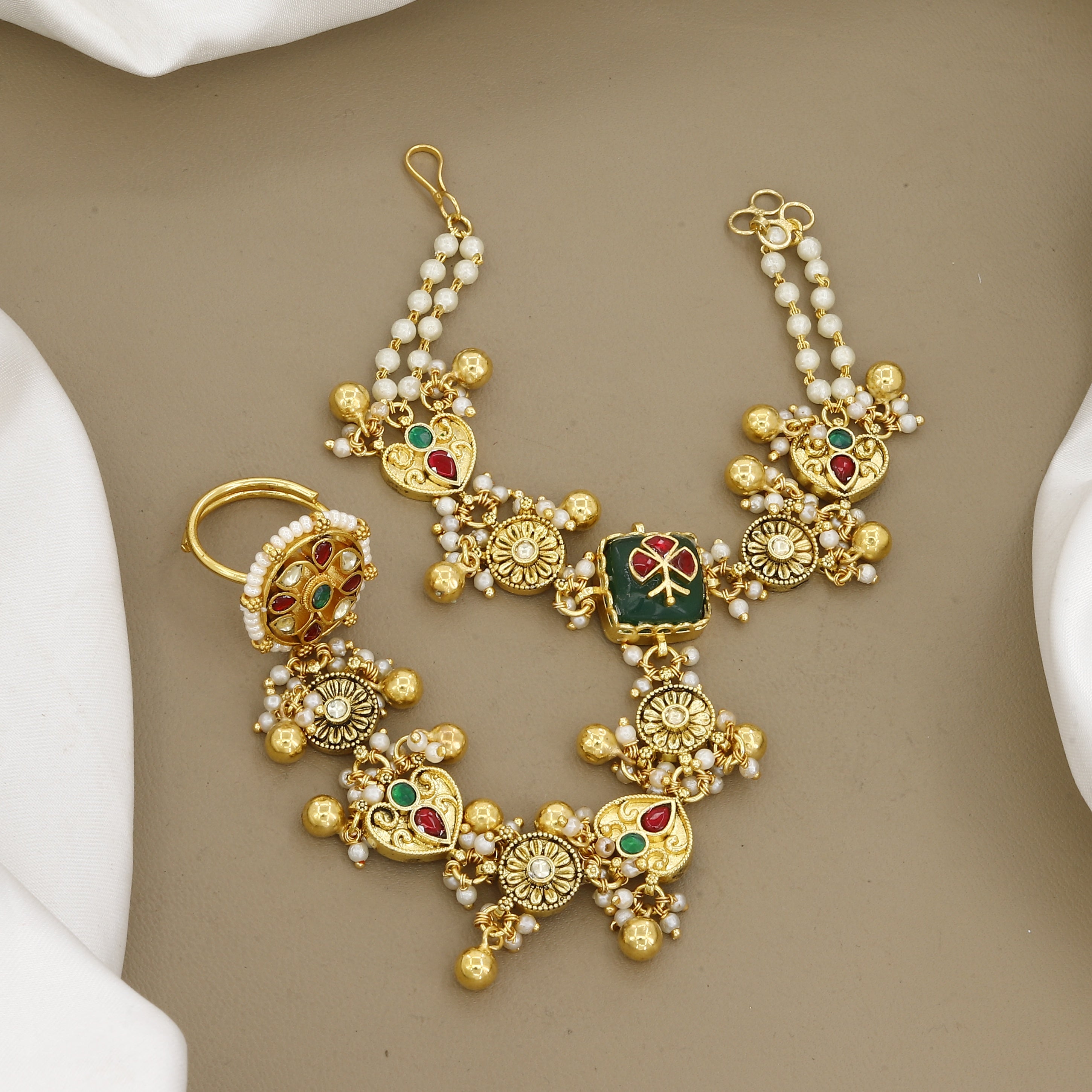 Ethnic Gold-Toned Haathphool with Green Stone & Pearl Charms