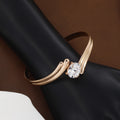 Rose Gold Bypass Cuff Bracelet with Oval Solitaire CZ Stone
