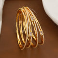 Sleek Gold-Tone CZ & Baguette Bangle Set of 4