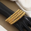 Intricate Gold-Plated Designer Bangles with Gemstones