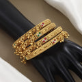 Designer Gold-Plated Bangle Set with Gemstones & Charms