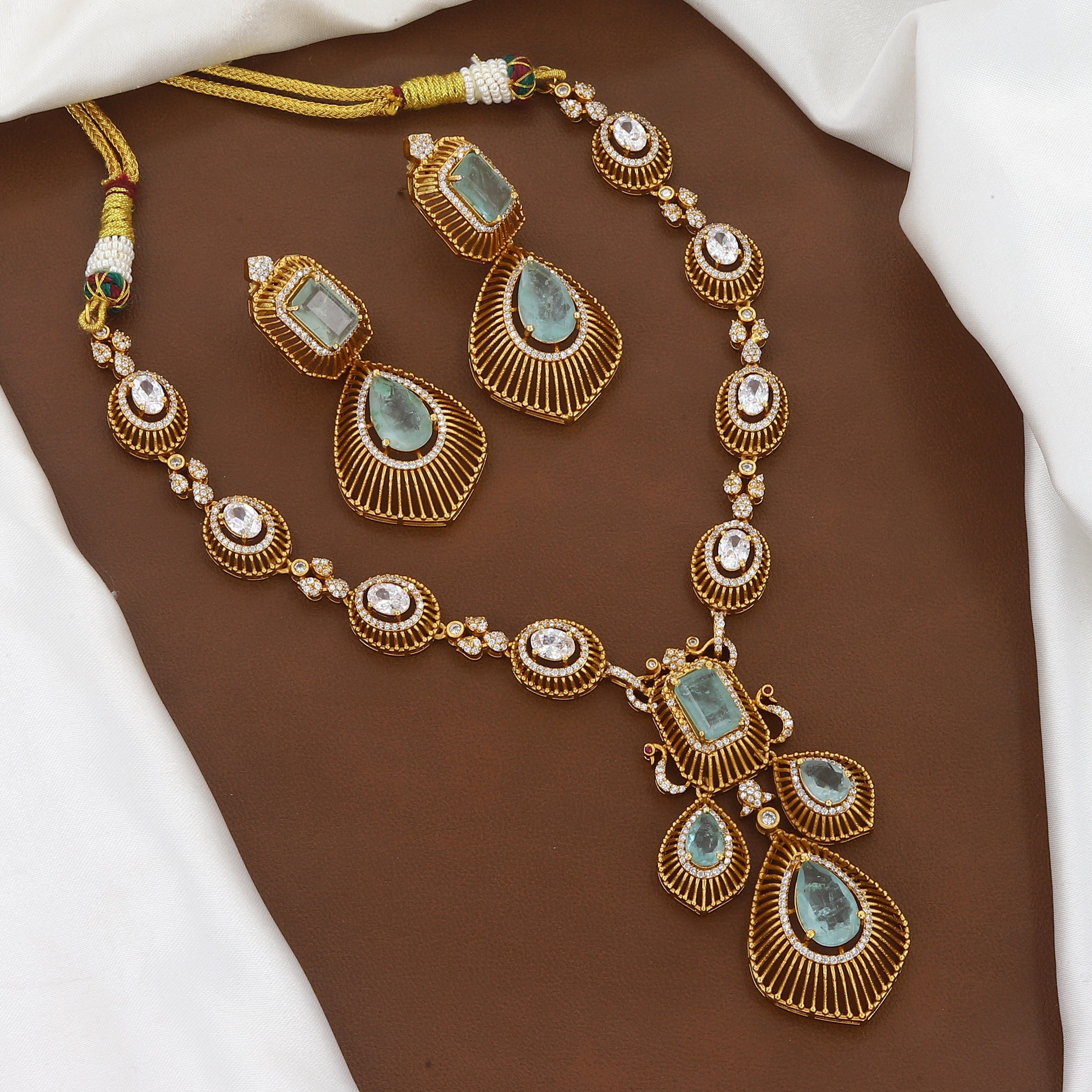 Traditional Ruby and Gold-Tone Diamond Necklace Set