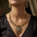 Antique Gold-Plated Necklace Set with Green Aventurine Stones and Floral Carvings